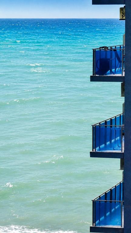 two sets of stairs leading to the ocean at Nautilus Apartment in Batumi