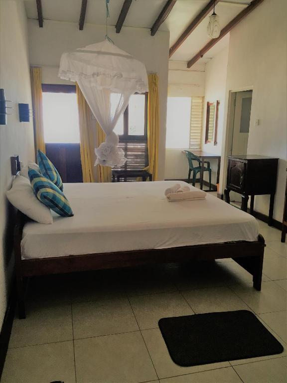 Postel nebo postele na pokoji v ubytování Dephani Beach Hotel