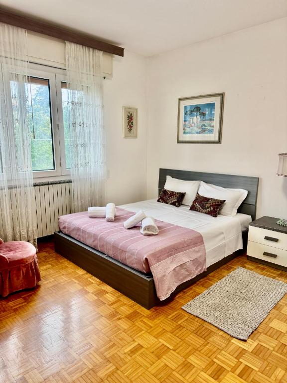 a bedroom with a large bed in a room at Abir's Apartments 2 in Marghera