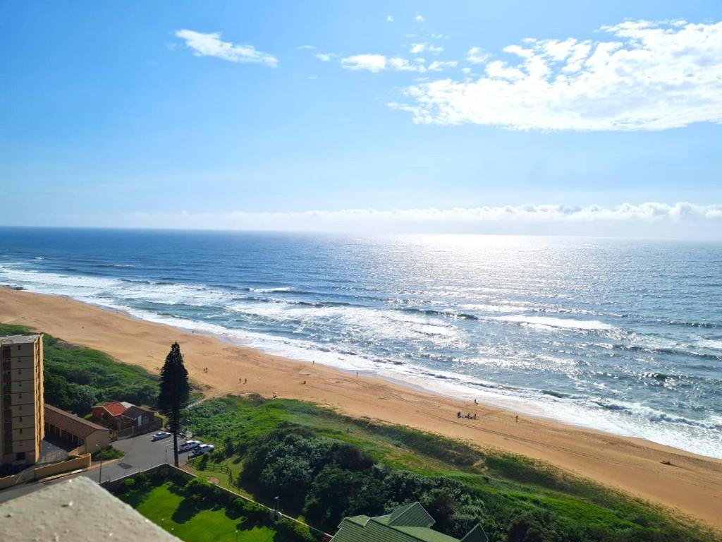 an aerial view of a beach with the ocean at Apartment on doonside Beach in Kingsborough