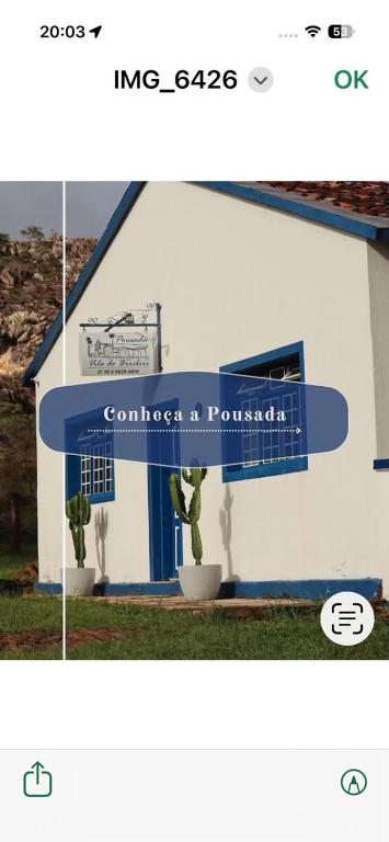 a building with a sign that reads connect a fortress at POUSADA VILA DO BIRIBIRI EXCLUSIVAMENTE DENTRO da VILA DO BIRIBIRI in Diamantina