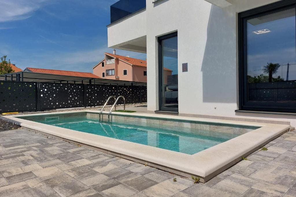Family-friendly apartments with swimming pool Milovcici, Krk - 25984