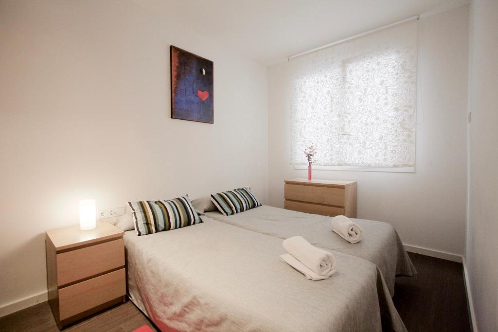 Posteľ alebo postele v izbe v ubytovaní Dalí Residence
