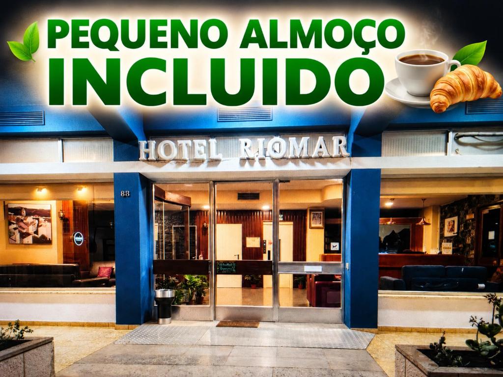 a hotel with a sign that reads pervez albuquerque indivo at Hotel Riomar in Lagos
