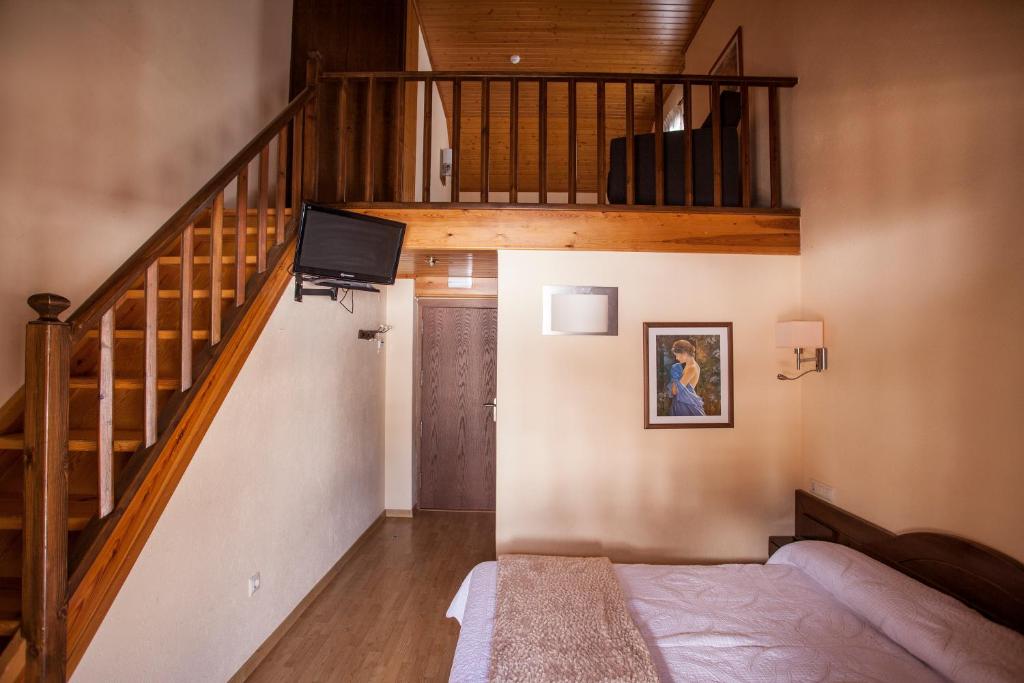 Postel nebo postele na pokoji v ubytování Hotel Avet