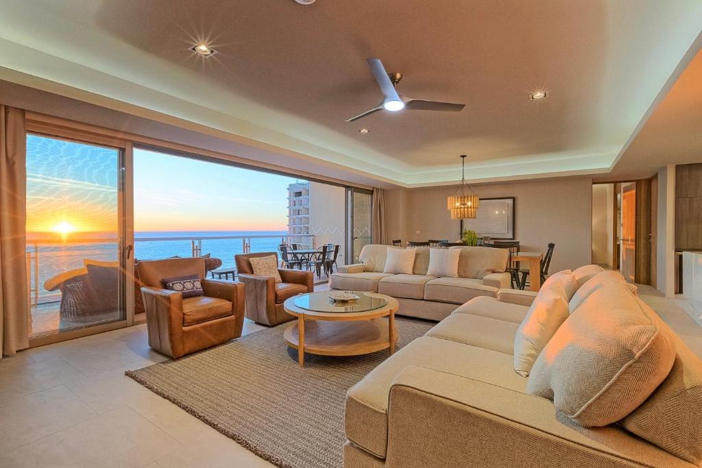 a living room with a view of the ocean at NEW Sonoran Star Luxury condo 2BD, 2BA in Puerto Peñasco