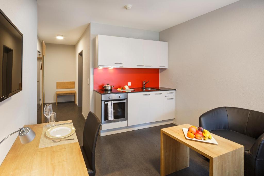 Kuchyň nebo kuchyňský kout v ubytování Aparthotel-aarau-WEST Swiss Quality