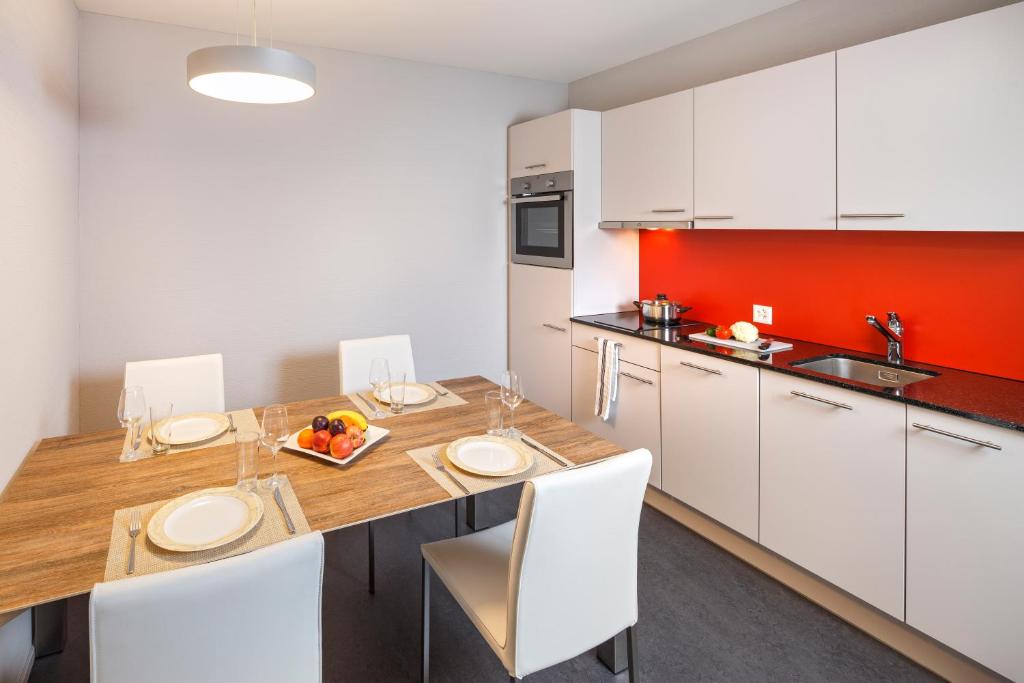 Kuchyň nebo kuchyňský kout v ubytování Aparthotel-aarau-WEST Swiss Quality