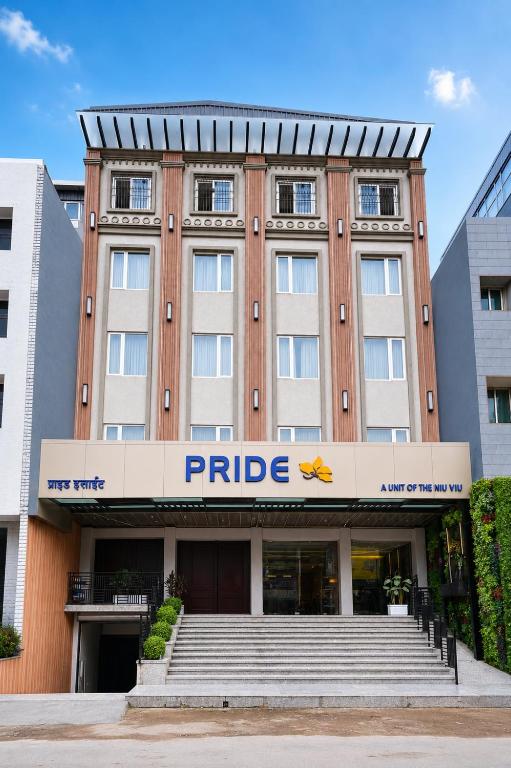a building with a pride sign on the front of it at Pride Elite Raipur in Raipur