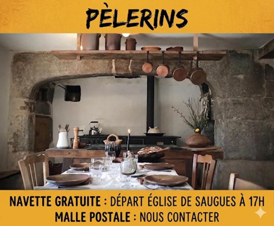 a poster of a kitchen with a table with food at Chambres et Tables d'hôtes - Les Ateliers de Pontajou - Pèlerin navette gratuite à Saugues in Venteuges