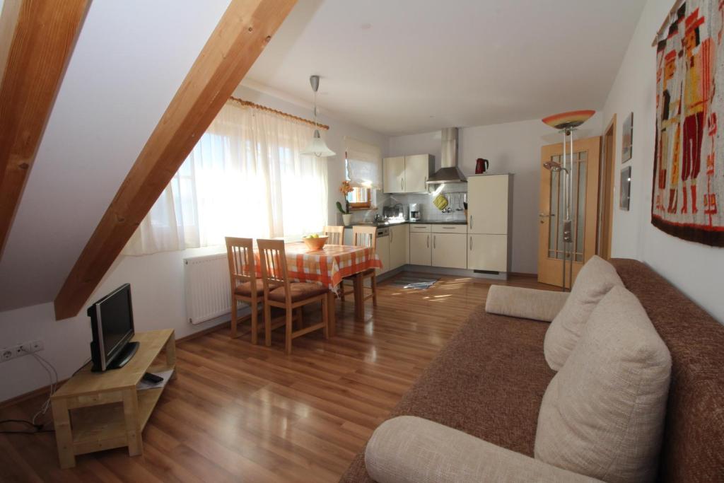 A kitchen or kitchenette at Apartments Im Winkl