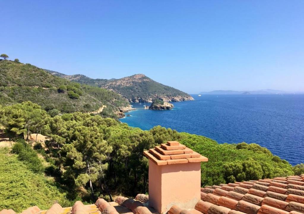 a view of the ocean from the roof of a house at Appartamenti Capo d'Arco in Capo D'Arco