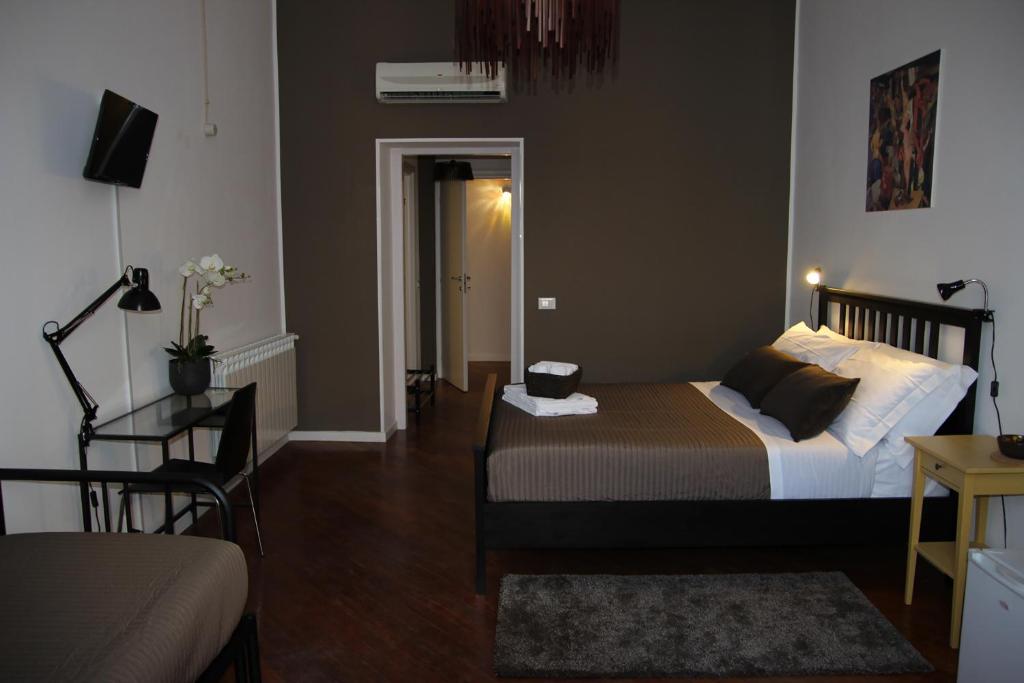 Łóżko lub łóżka w pokoju w obiekcie B&B Gallidoro