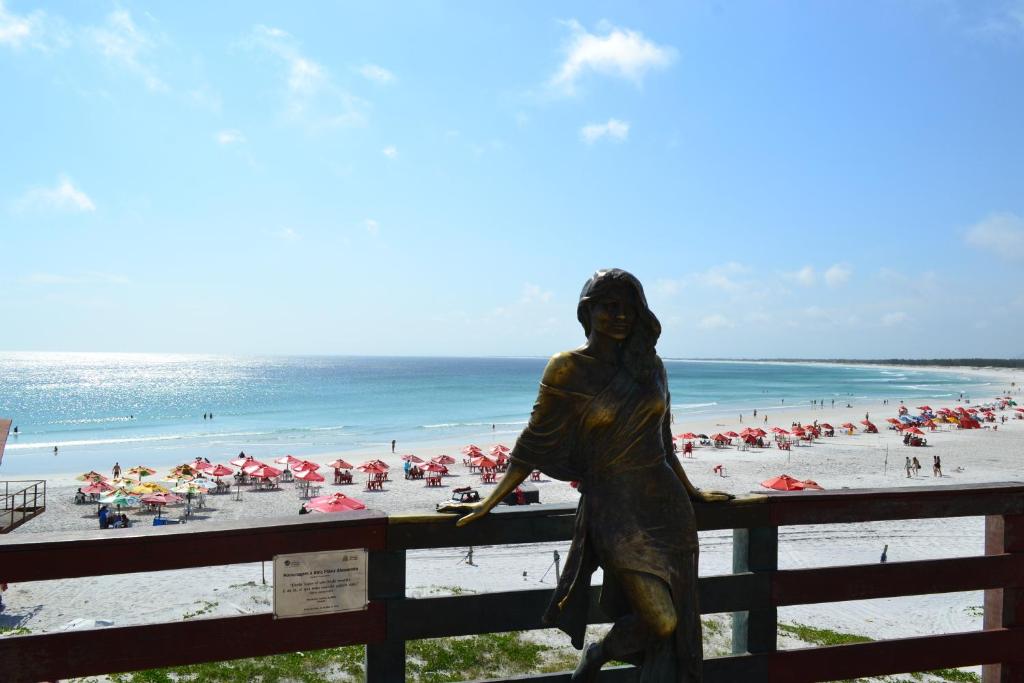  Casa com garagem e churrasqueira a 5 minutos da Praia Grande