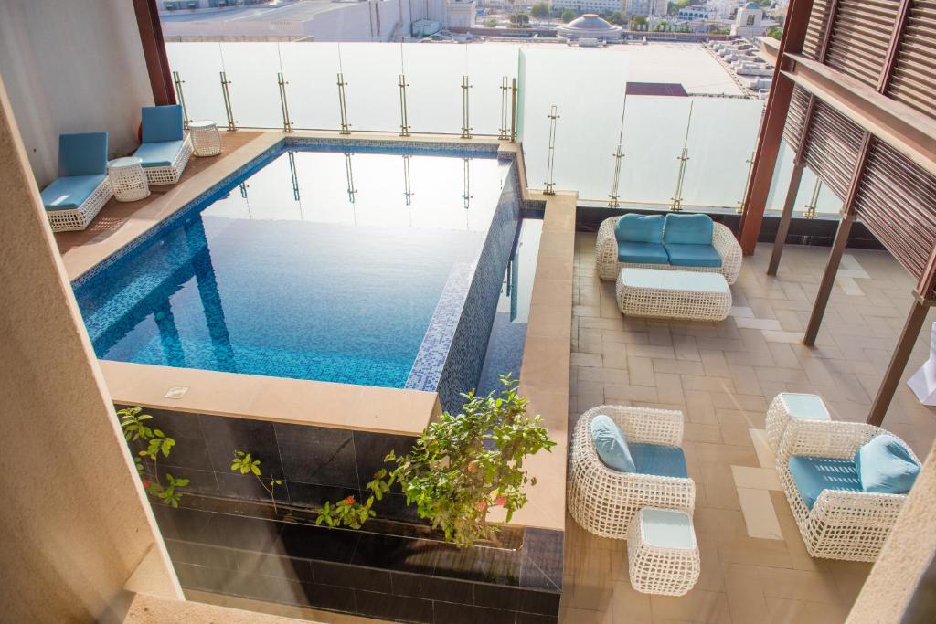 لابی و فضای عمومی Grand Millennium Muscat Apartments and Suites connected to Mall - تصویر ۵