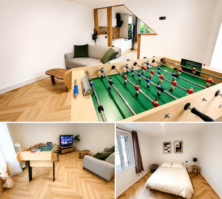 a living room with a pool table in the middle of a room at Ô Cœur d'Objat - Baby-foot - Clim in Objat