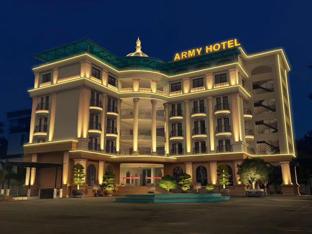 aania hotel is lit up at night at Army Hotel in Yen
