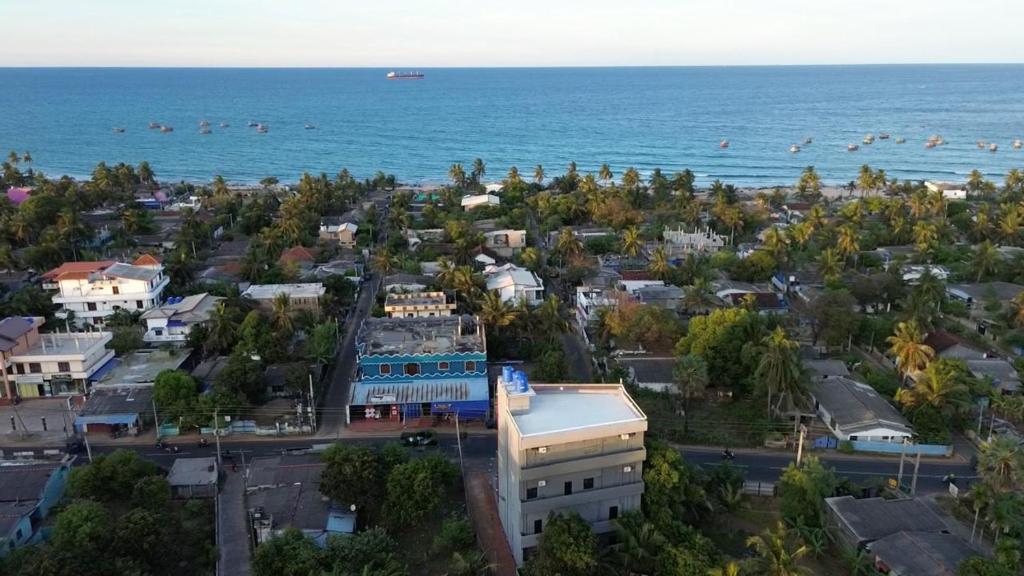 an aerial view of a city and the ocean at RR complex in Trincomalee