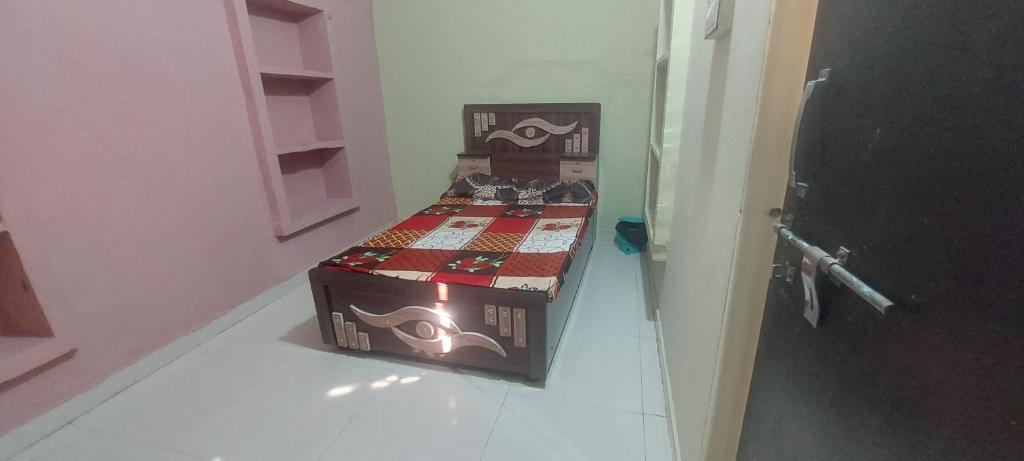 two boxes sitting on the floor in a room at Hotel KANHA in Karauli