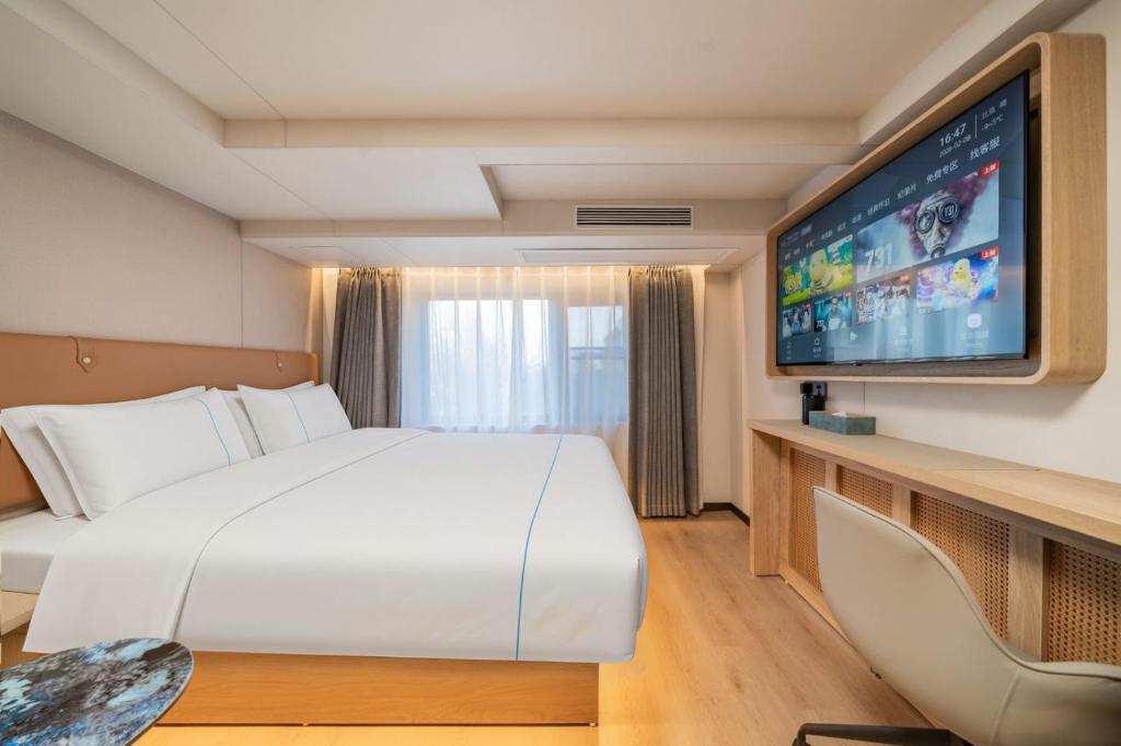 تصویر اتاق‌های Dequan Wanxiang International Hotel, near Sanlitun and SOLANA - تصویر ۲