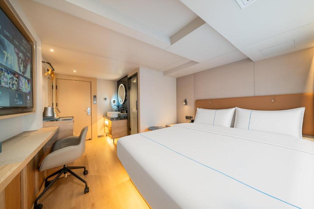 لابی و فضای عمومی Dequan Wanxiang International Hotel, near Sanlitun and SOLANA - تصویر ۵