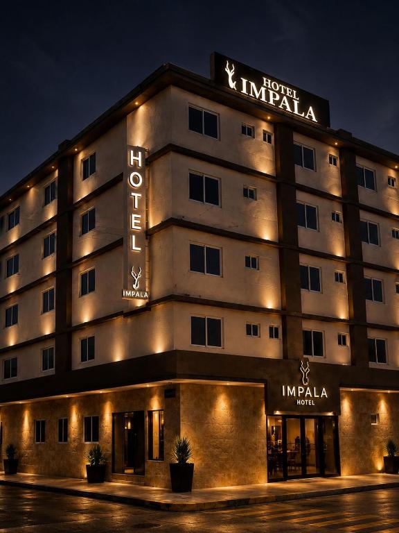 a building with a sign that reads hotel imperia at Hotel Impala Veracruz in Veracruz