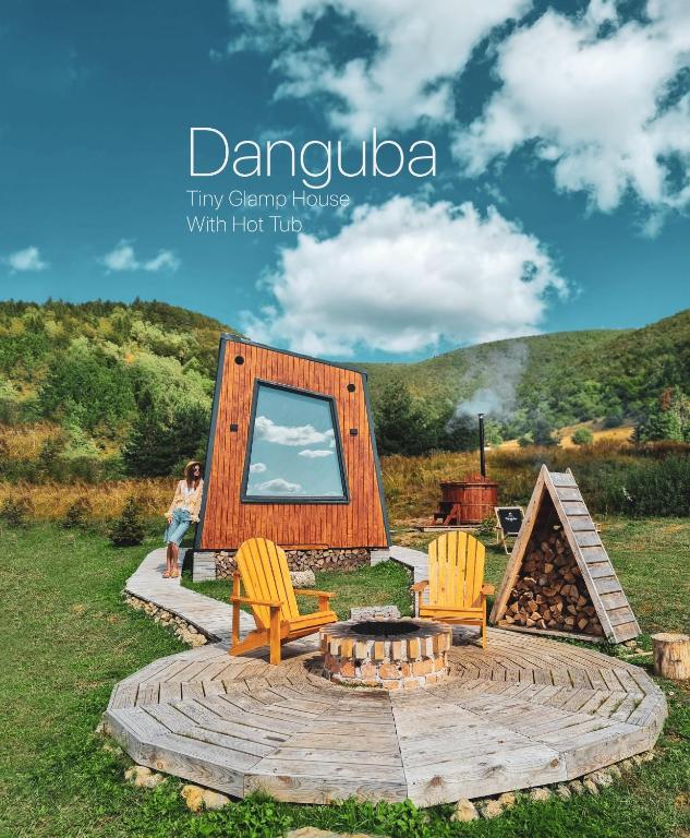 a tiny camp house with a fire pit at DANGUBA - Tiny Glamp House With Hot Tub by IGLENA in Kupres