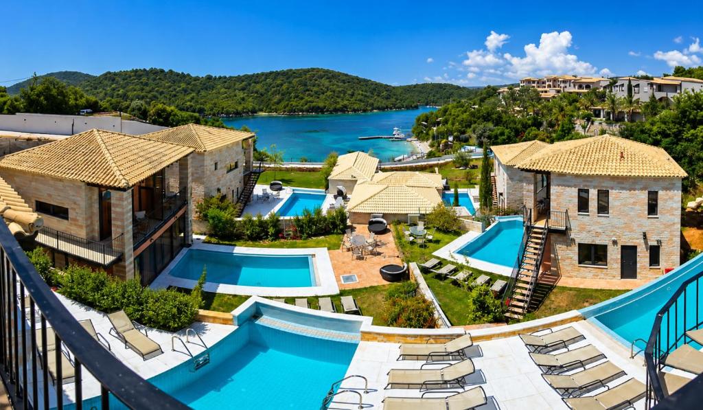 an aerial view of a resort with two pools at Ornella Beach Resort & Villas in Syvota