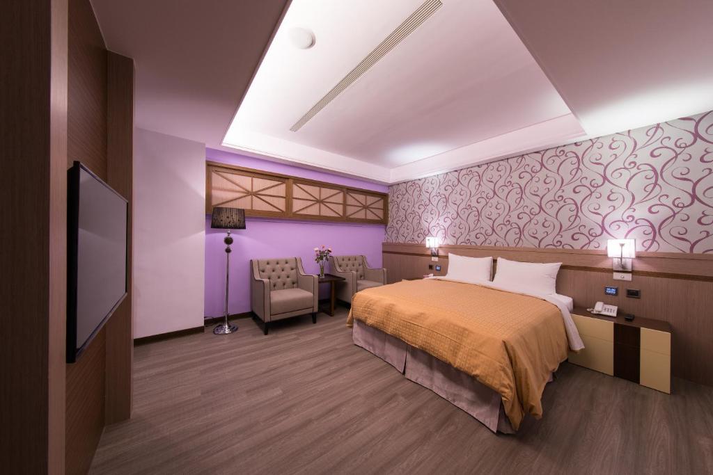 Postel nebo postele na pokoji v ubytování Sir Motel - Sanchong