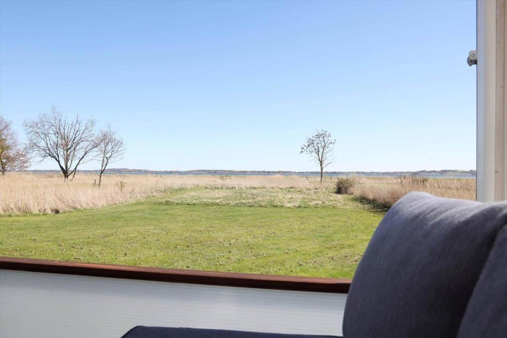 a view of a field from a window at 14250-Grevinge-Hybenvaenget-9 in Grevinge