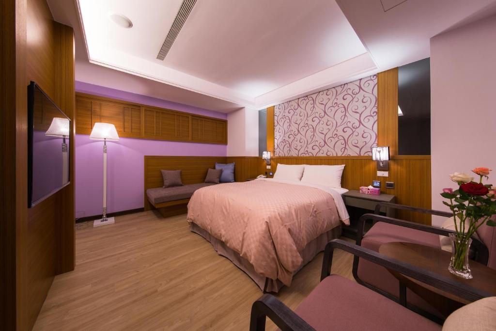 Postel nebo postele na pokoji v ubytování Sir Motel - Sanchong