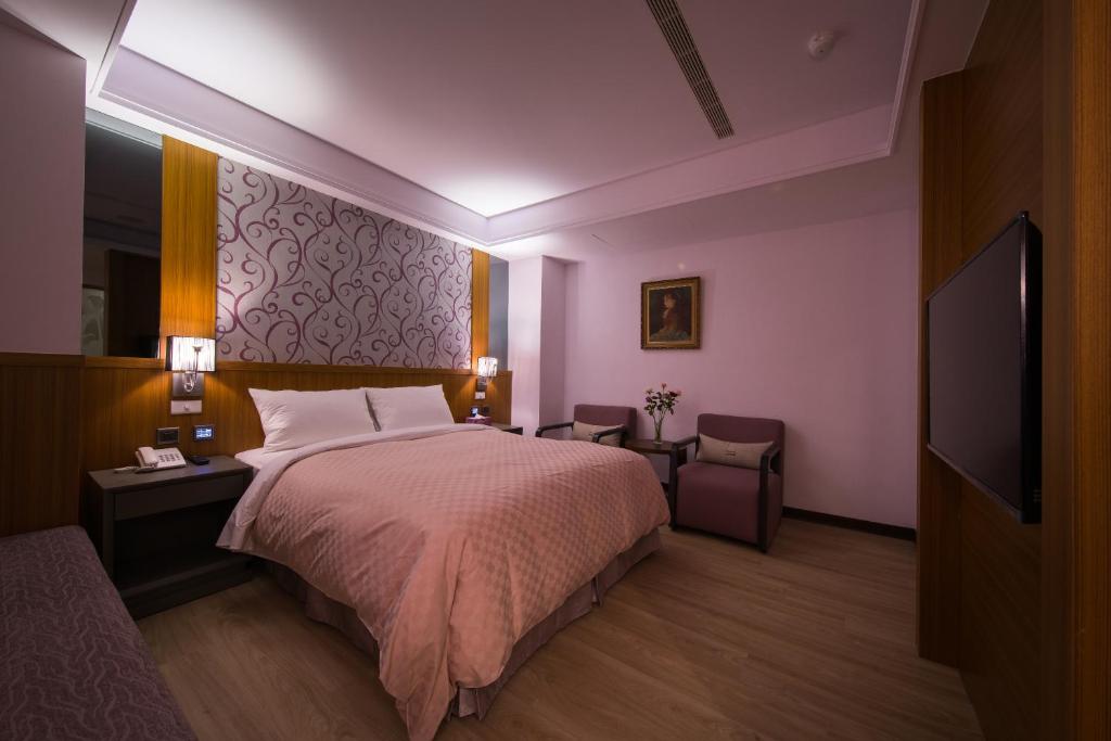 Postel nebo postele na pokoji v ubytování Sir Motel - Sanchong