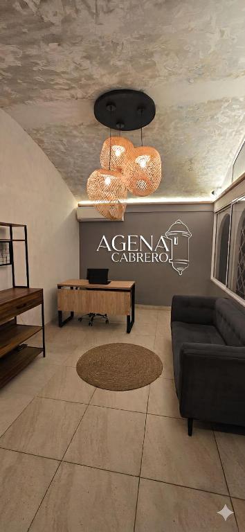 a living room with a couch and a table at Agena Cabrero in Cartagena de Indias