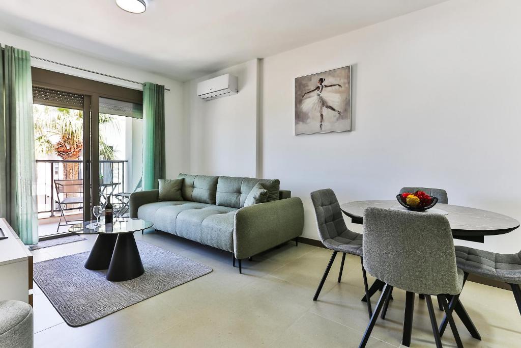 a living room with a couch and a table at Seaside Premium Apartments Bar - Susanj in Bar