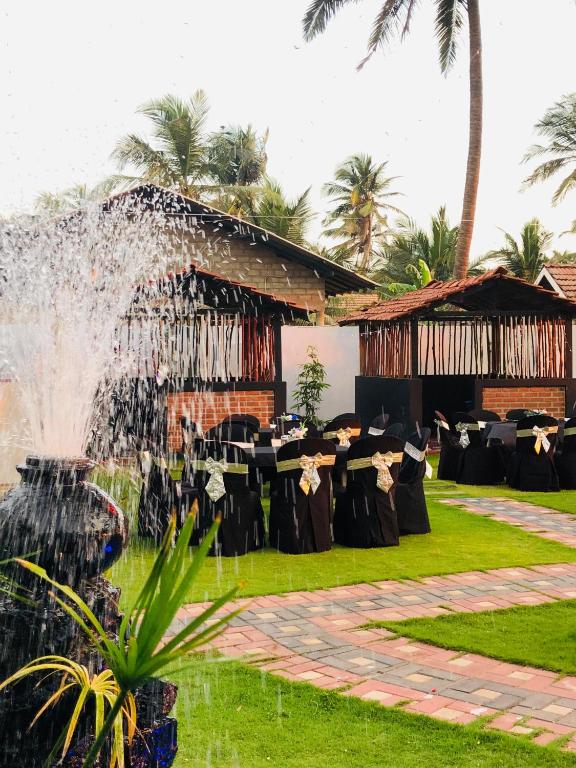 a table set up for a wedding at a resort at New Romantic Beach Hotel in Toduwawa South