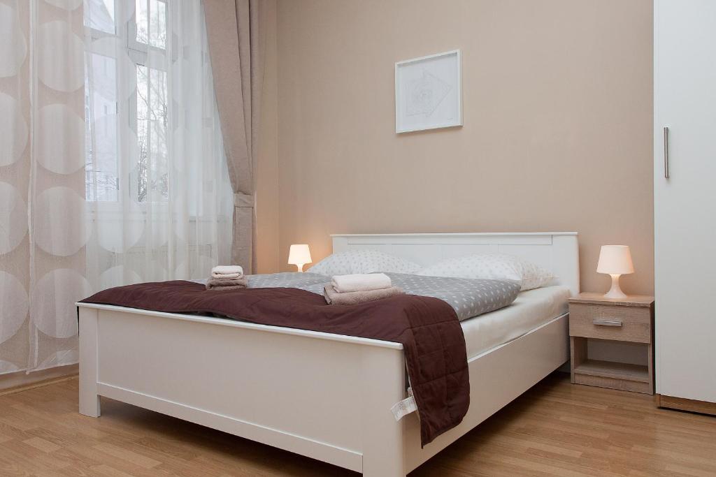 Postel nebo postele na pokoji v ubytování Hotel Richmond Teplice