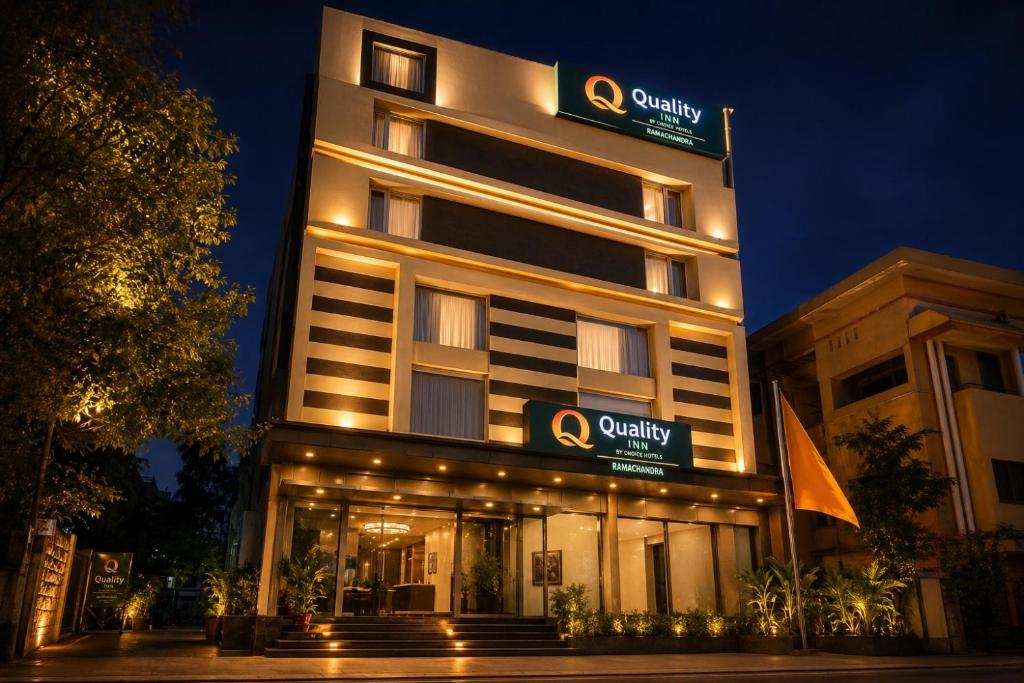 a building with a sign on top of it at Quality Inn Ramachandra in Visakhapatnam