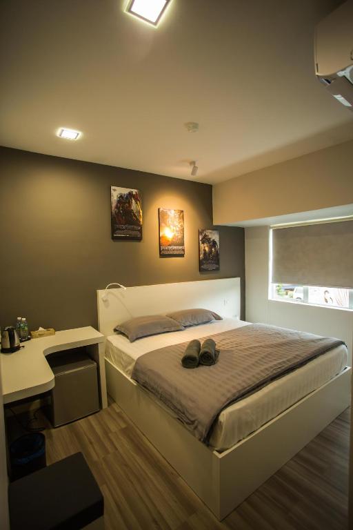Postel nebo postele na pokoji v ubytování Hollywood Hotel