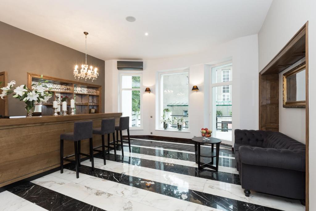 Posedenie v ubytovaní Grottger Luxury Boutique Hotel City