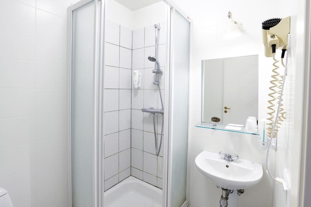 Koupelna v ubytování Fosshotel Baron