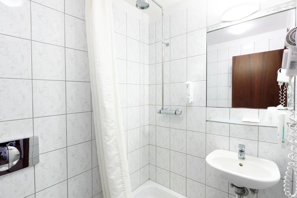 Koupelna v ubytování Fosshotel Baron