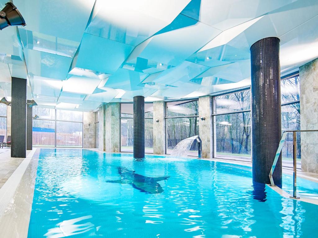 Bazén v ubytovaní VacationClub - Diune Apartment 502A alebo v jeho blízkosti