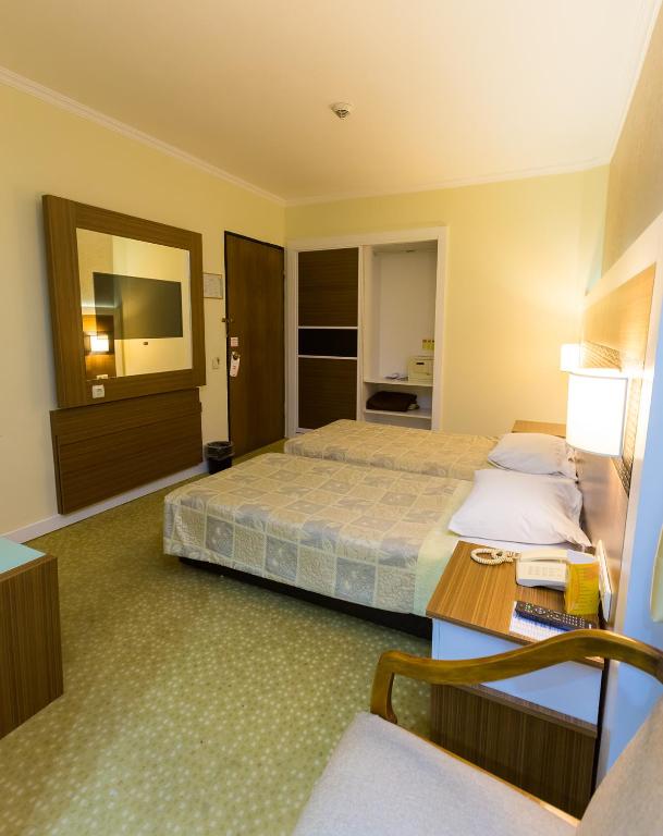 Postel nebo postele na pokoji v ubytování Derici Hotel
