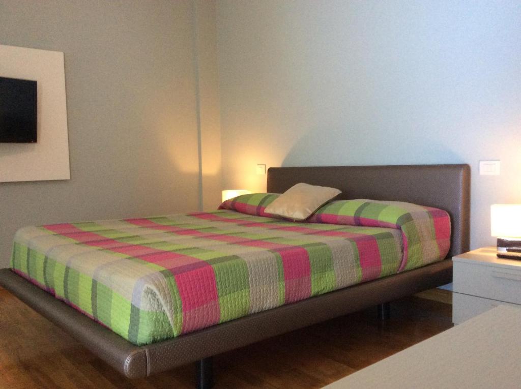 Postel nebo postele na pokoji v ubytování Relais Forti