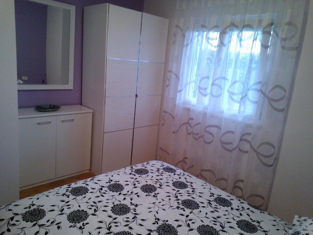 Posteľ alebo postele v izbe v ubytovaní Tone & Marta Apartments