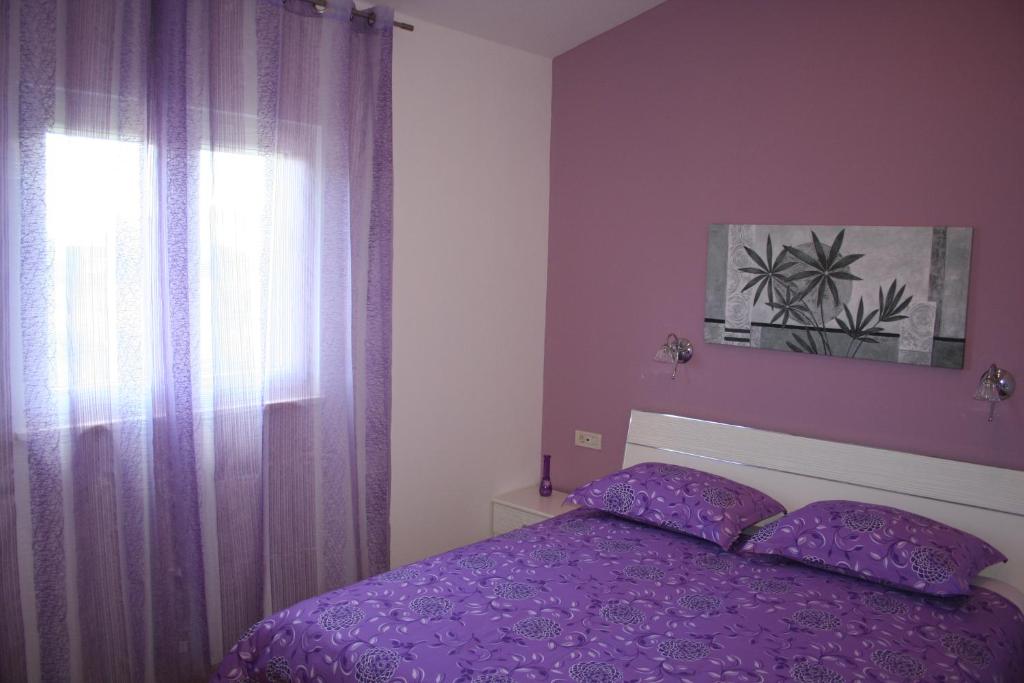 Posteľ alebo postele v izbe v ubytovaní Tone & Marta Apartments