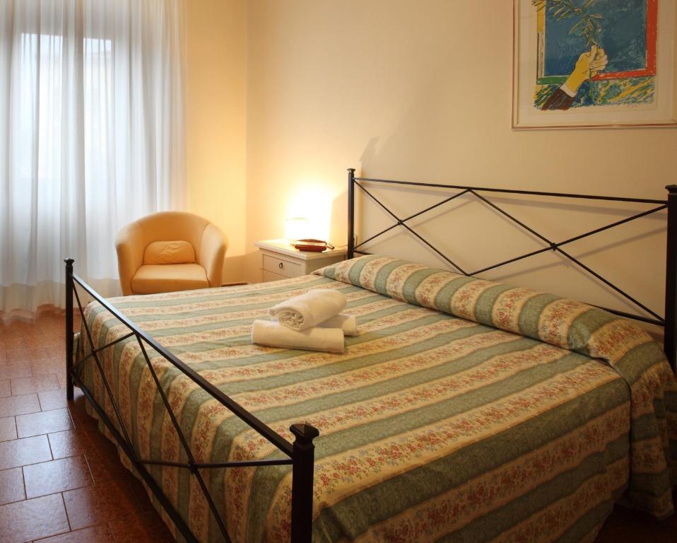 Postel nebo postele na pokoji v ubytování Hotel PRime
