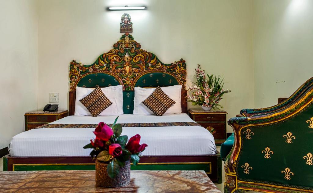 Postel nebo postele na pokoji v ubytování Hotel Sunstar Residency