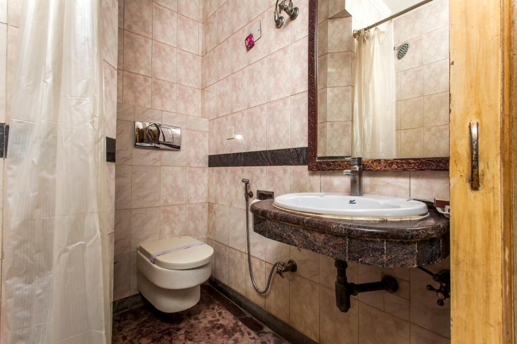 Koupelna v ubytování Hotel Sunstar Residency