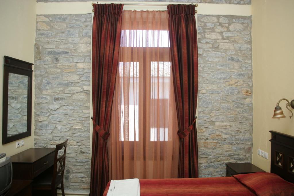 Postel nebo postele na pokoji v ubytování Guesthouse Aktaion